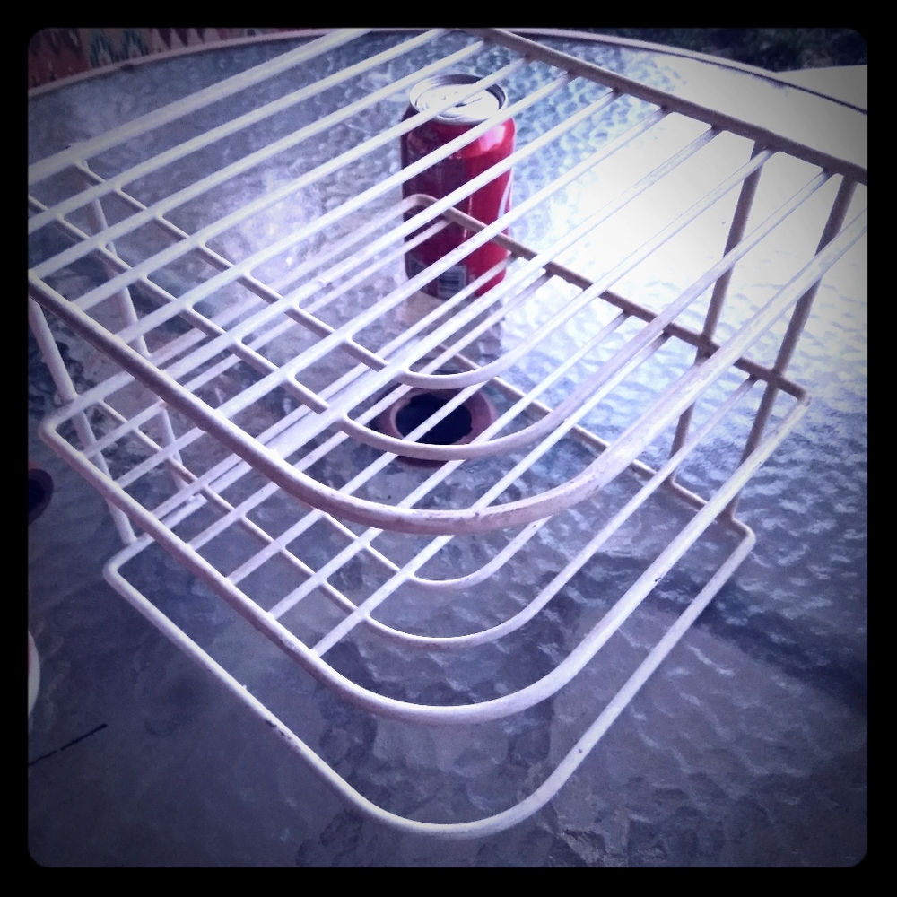 Corner metal shelf